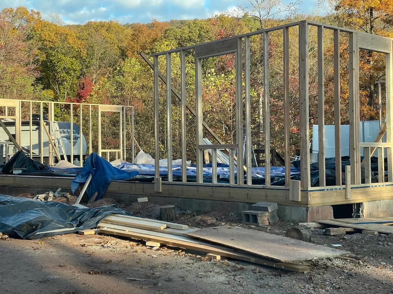 Timber wall framing with window openings on a home under construction