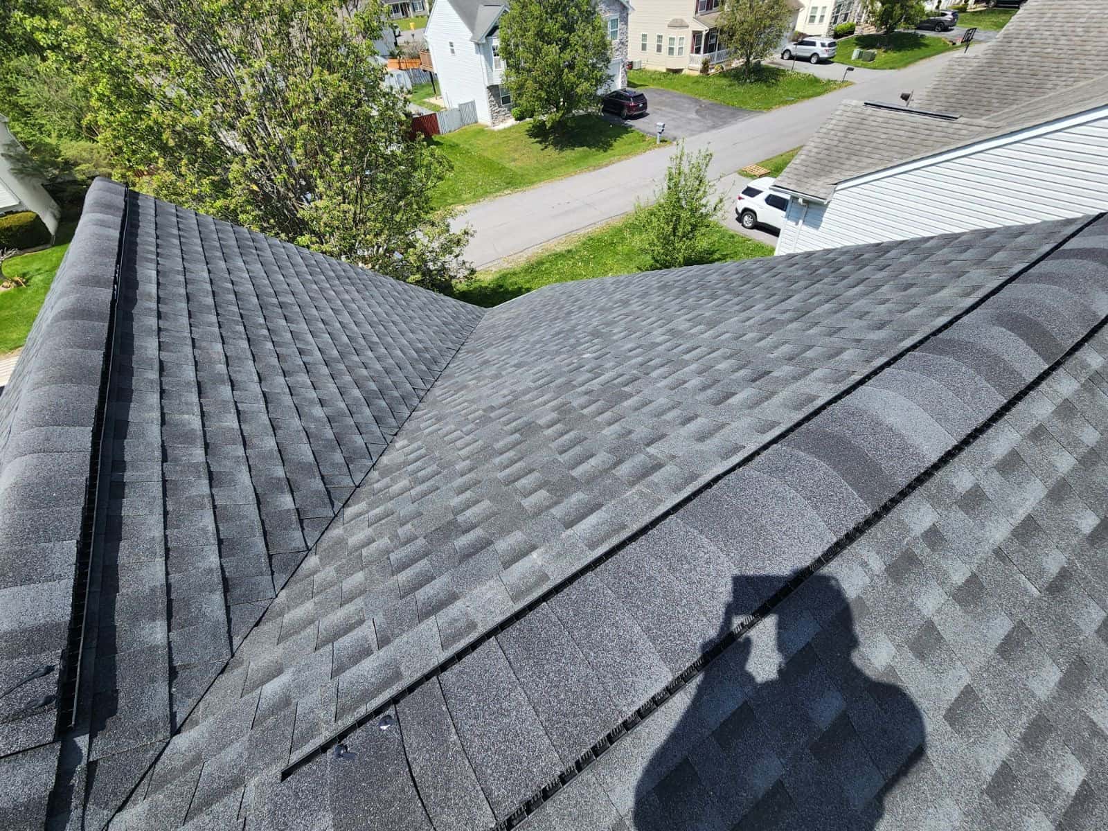 New charcoal shingle roof slope
