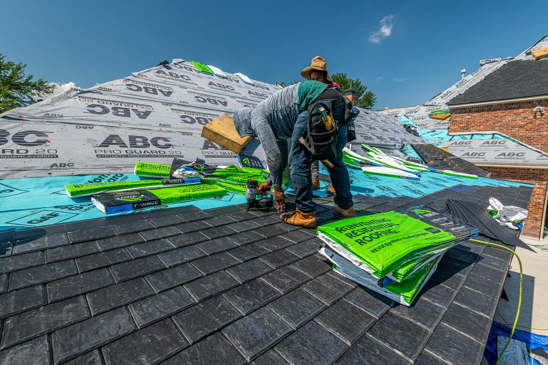 Full roof tear-off in progress with ABC Pro Guard underlayment