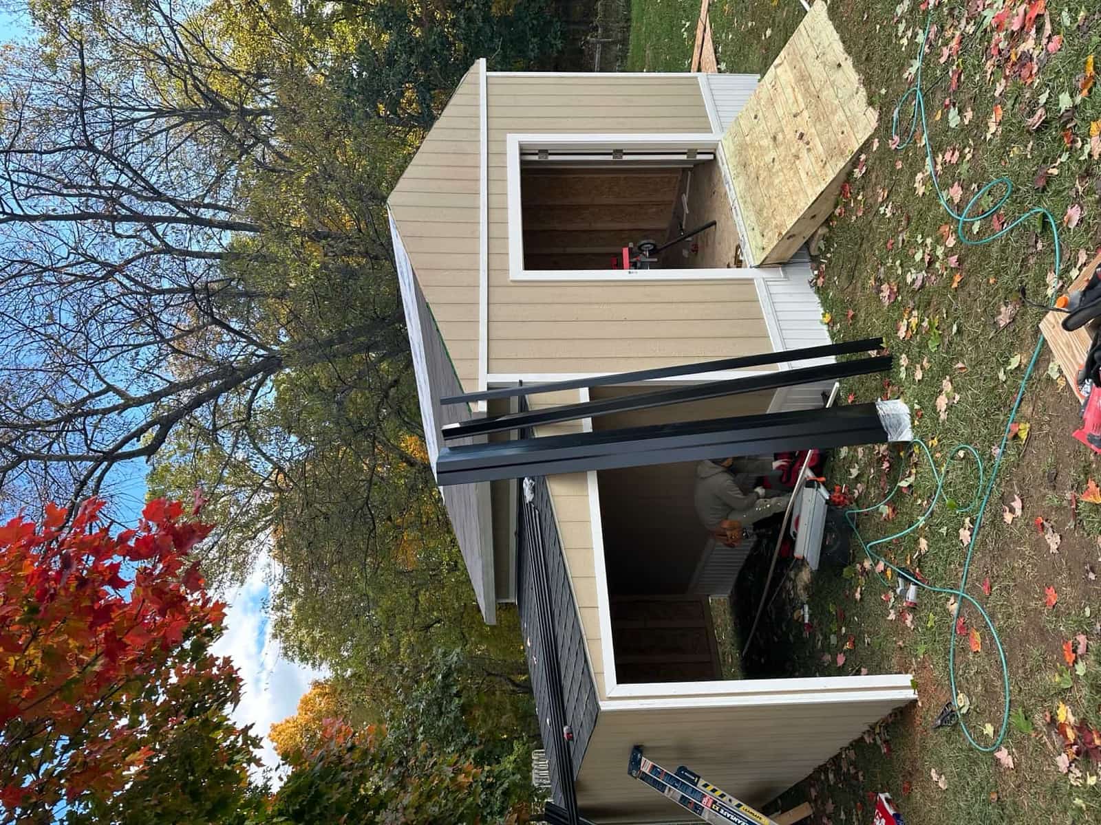 Custom built shed with trim and siding